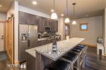Modern Kitchen with Stainless Steel Appliances- Bar Seating for 4